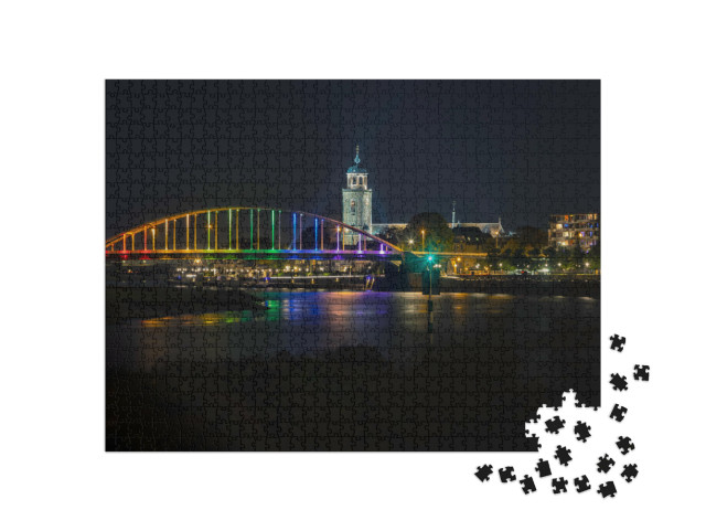 Puzzel 1000 stukjes „Regenboogkleuren op de brug over de IJssel bij Deventer“