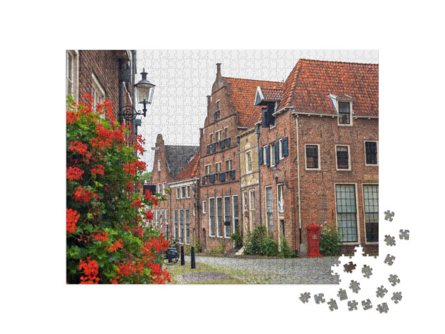 Puzzel 1000 stukjes „Rode geranium en brievenbus in een straat in Deventer, Nederland“