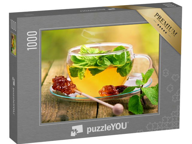 Puzzel 1000 stukjes „Thee in een glazen kopje met muntblad en bruine rietsuiker“