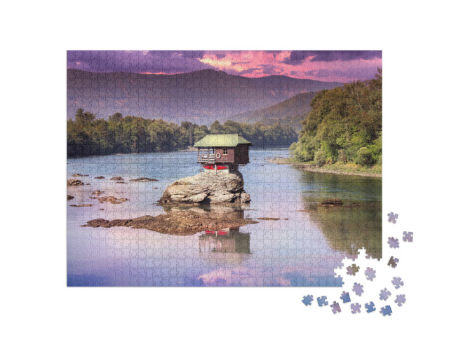 Puzzel 1000 stukjes „Kleurrijk huisje op de rots midden in de rivier de Drina, Servië“