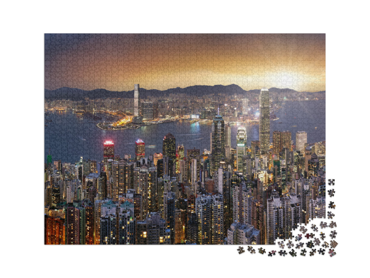 Puzzel 2000 stukjes „Panorama van de skyline van Hongkong bij zonsondergang“