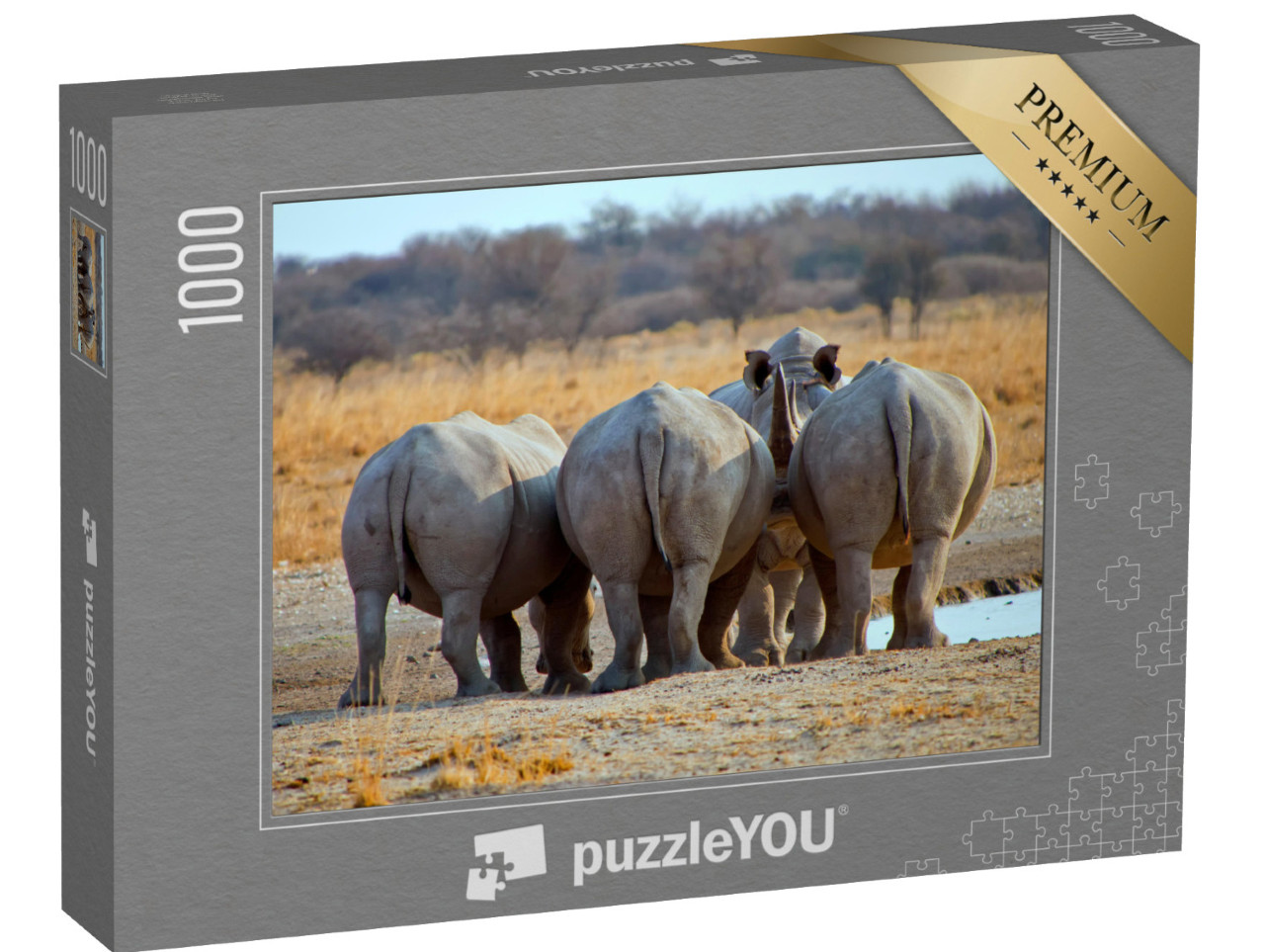 Puzzel 1000 stukjes „Drie witte neushoorns, Botswana Afrika“