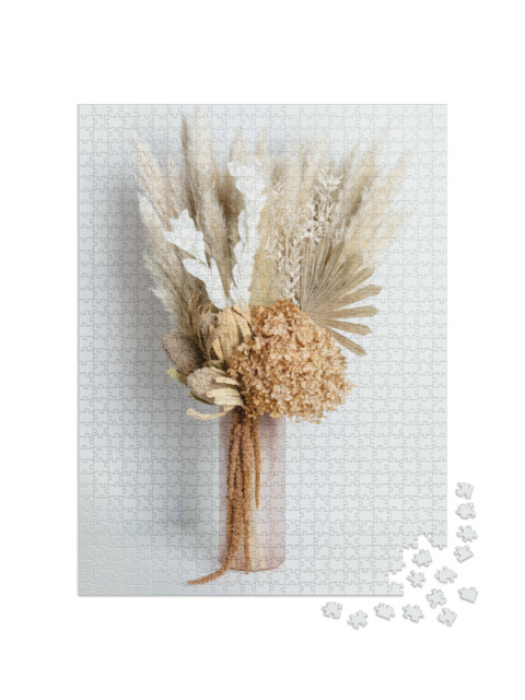 Puzzel 1000 stukjes „Gedroogd bloemstuk met banksia, hortensia, pampagras, palmbladeren“