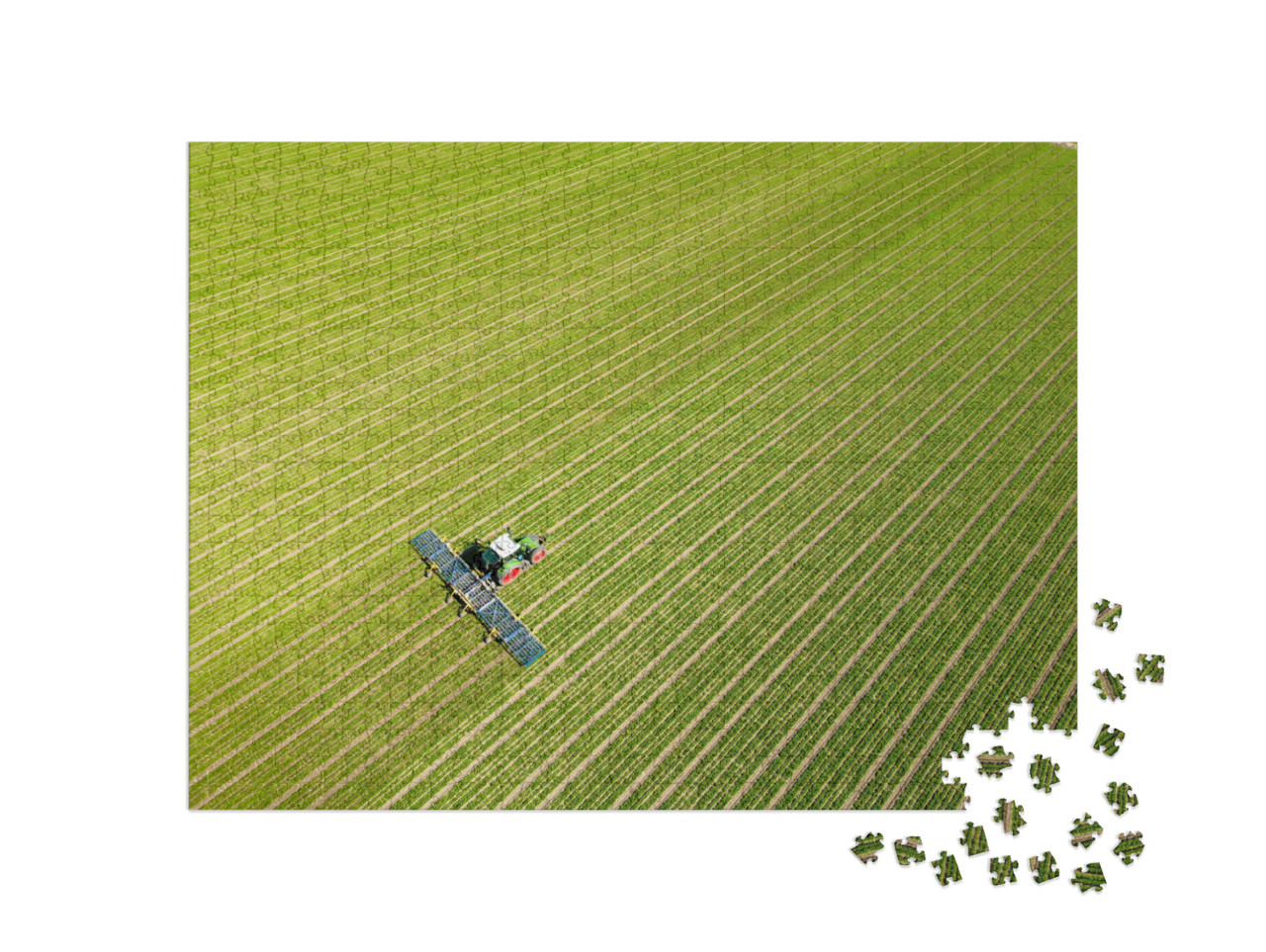 Puzzel 1000 stukjes „Luchtfoto van een boer aan het werk op zijn land, Flevoland“