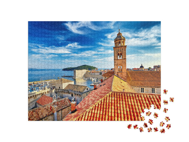 Puzzel 1000 stukjes „Uitzicht over daken: oude stad Dubrovnik bij zonsondergang, Kroatië“