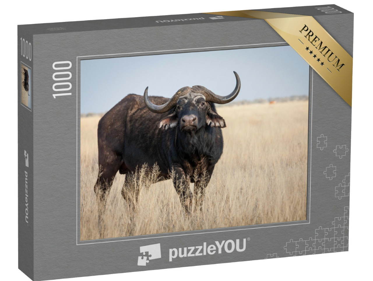 Puzzel 1000 stukjes „Een grote oude Kaapse buffelstier op een grasvlakte“