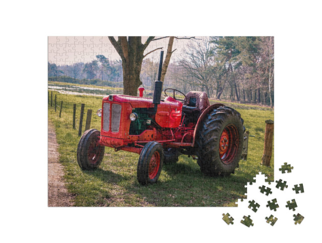 Puzzel 500 stukjes „Rode oldtimer tractor in Drenthe bij Havelte“