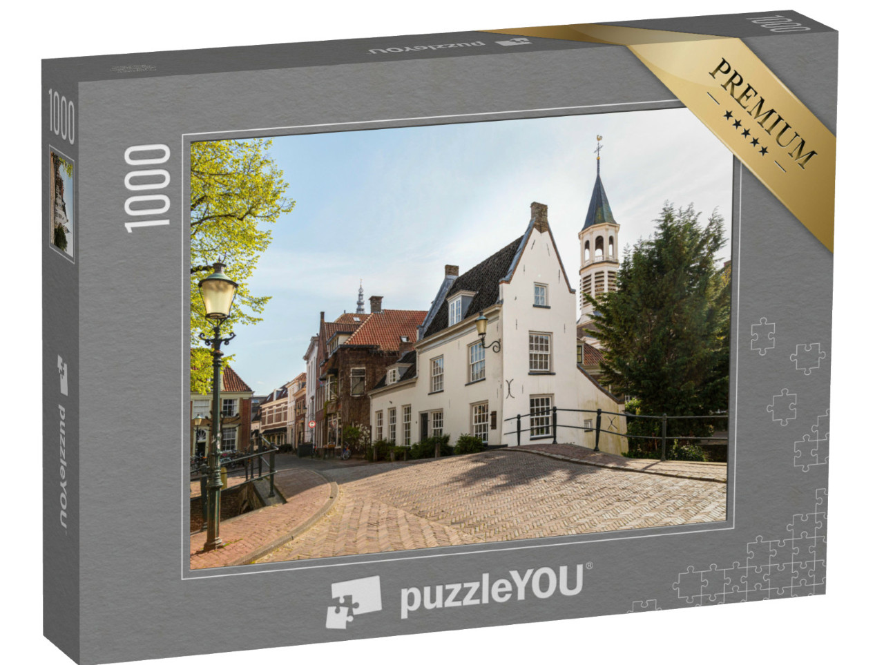 Puzzel 1000 stukjes „Straten in Amersfoort met historische grachtenpanden en de Elleboogkerk op de achtergrond“
