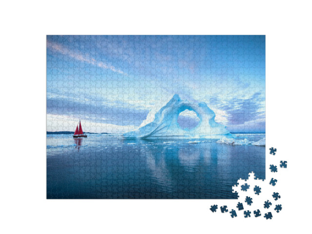 Puzzel 1000 stukjes „Zeilboot met rode zeilen voor enorme ijsbergen in de avond, Disko Bay, Groenland“