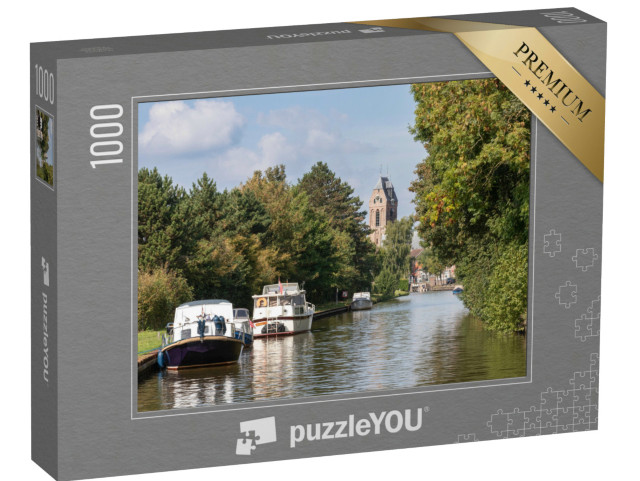 Puzzel 1000 stukjes „IJssel in het pittoreske Oudewater met de Sint-Michielskerk op de achtergrond“