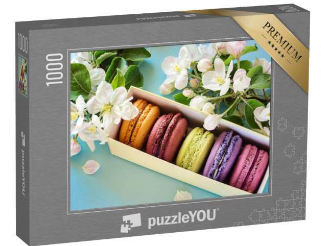 Puzzel 1000 stukjes „Doos kleurrijke macarons omlijst door appelbloesems“