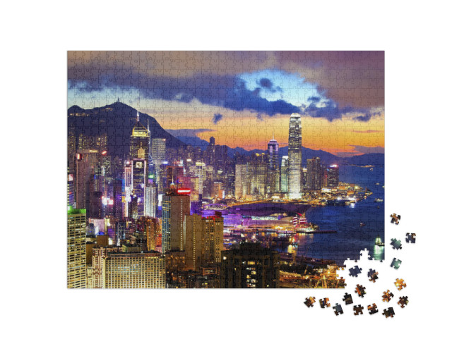 Puzzel 1000 stukjes „Helder verlicht Hong Kong bij zonsondergang“