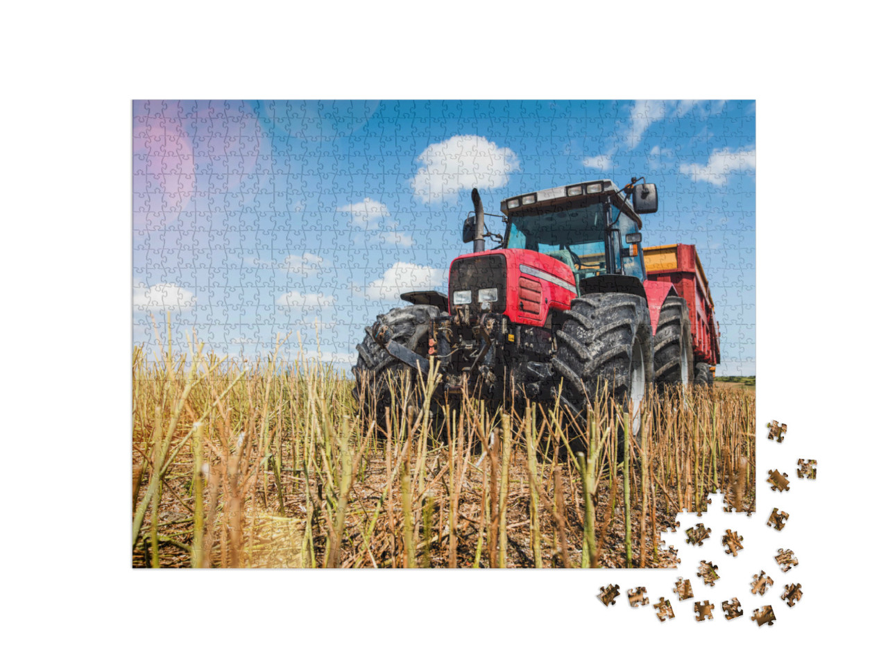 Puzzel 1000 stukjes „Een tractor in een geoogst koolzaadveld“