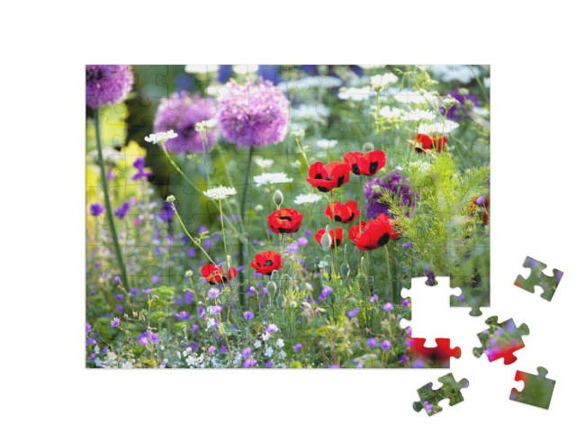 Puzzel 100 stukjes „Zonovergoten wilde bloementuin“