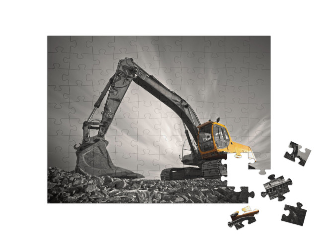 Puzzel 100 stukjes „Graafmachine op stenige grond“