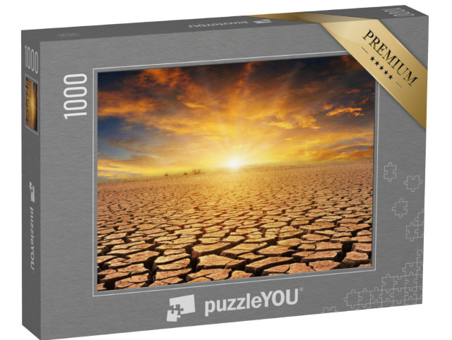 Puzzel 1000 stukjes „Oranjekleurige zonsondergang boven een steenwoestijn“