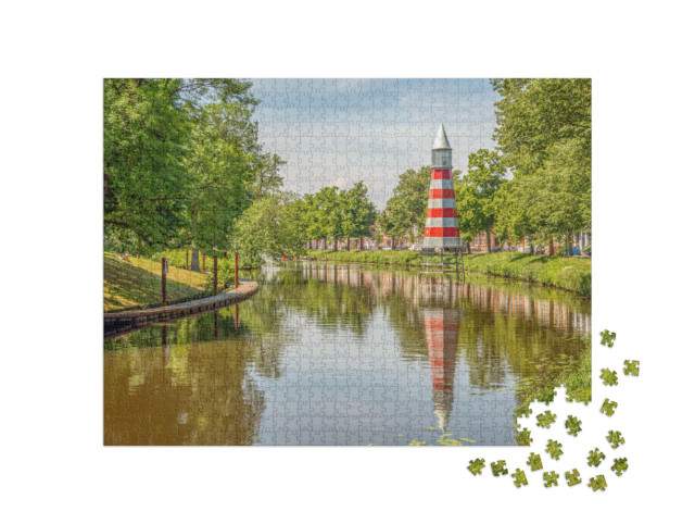 Puzzel 1000 stukjes „Stadsgezicht van Breda, een vuurtoren op de achtergrond“