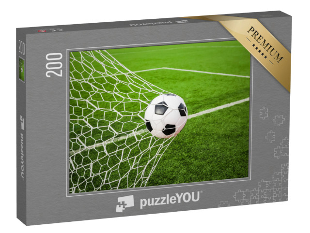 Puzzel 200 stukjes „Voetbal in het doelnet“