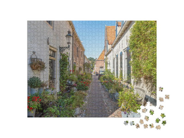 Puzzel 1000 stukjes „Kleine straat met oude, kleine en authentieke huizen in het centrum van Elburg“