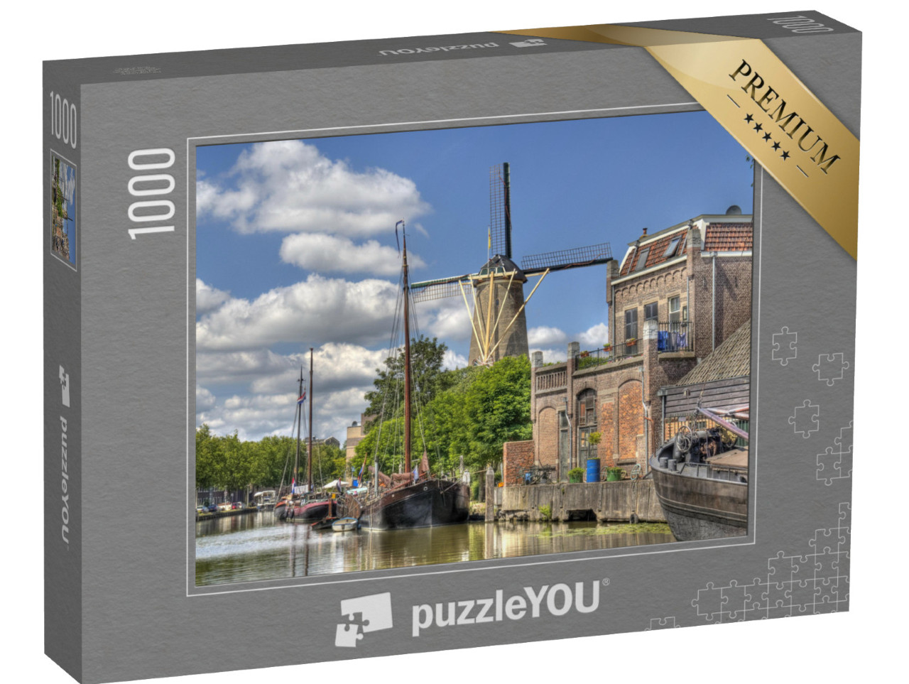 Puzzel 1000 stukjes „Windmolen en historische boten in een gracht in Gouda“