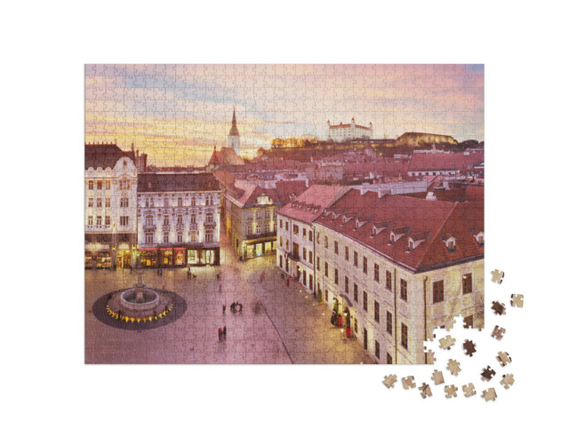 Puzzel 1000 stukjes „Panoramisch uitzicht op Bratislava bij zonsondergang“
