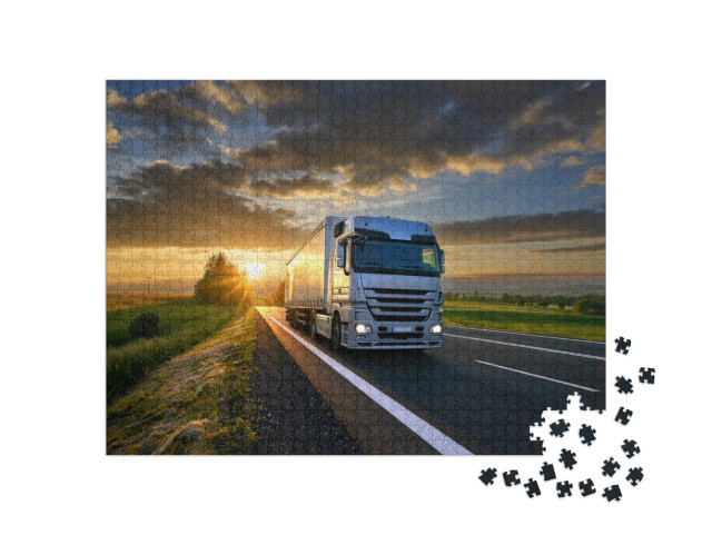 Puzzel 1000 stukjes „Vrachtwagen in de zonsondergang“