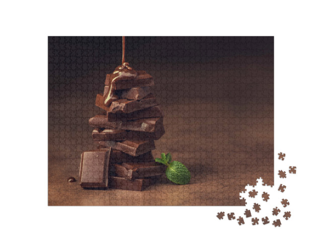 Puzzel 1000 stukjes „Gesmolten chocolade over chocoladestukjes“