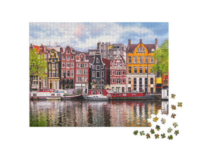 Puzzel 1000 stukjes „De dansende huizen aan de Amstel, een bezienswaardigheid van Amsterdam“