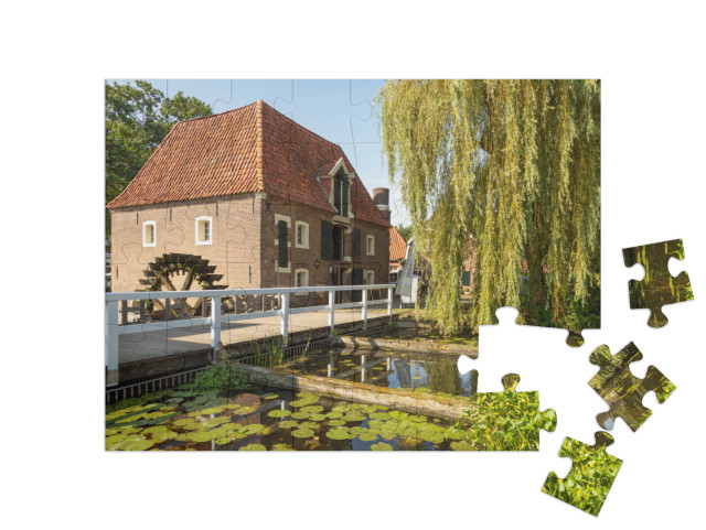 Puzzel 48 stukjes „Watermolen en sluis in het pittoreske dorpje Borculo in de Achterhoek“