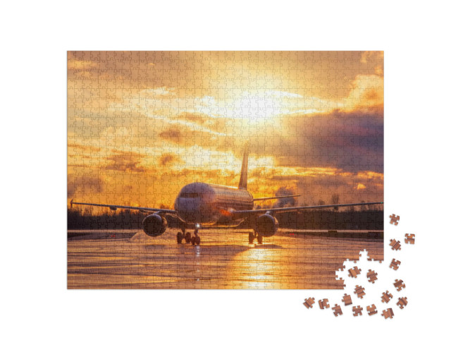 Puzzel 1000 stukjes „Vliegtuigen op de startbaan in de gloedvolle zonsondergang“