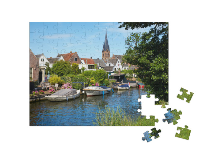 Puzzel 100 stukjes „Breukelen met de Vecht, provincie Utrecht“
