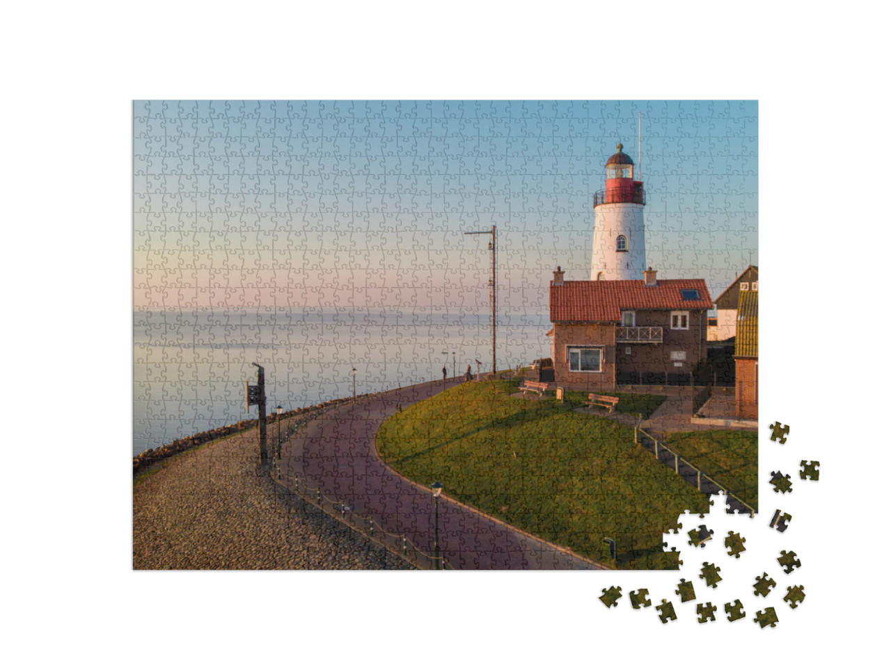 Puzzel 1000 stukjes „Zonsondergang bij de vuurtoren en haven van Urk“