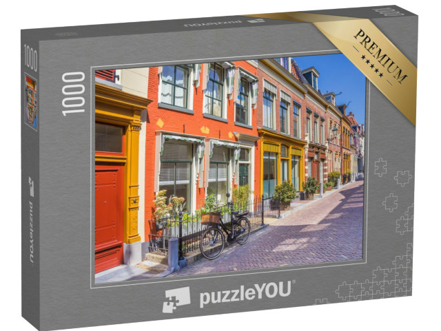 Puzzel 1000 stukjes „Fiets voor de kleurrijke huizen van de historische stad Leeuwarden, Nederland“