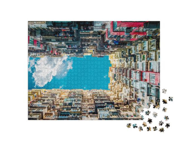 Puzzel 1000 stukjes „Architectuur vanuit een spannend perspectief van onderaf tegen de lucht“