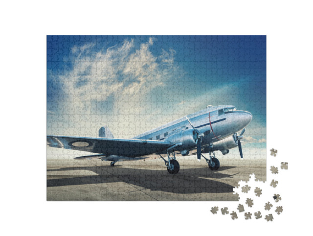 Puzzel 1000 stukjes „Historisch vliegtuig op een vliegveld“