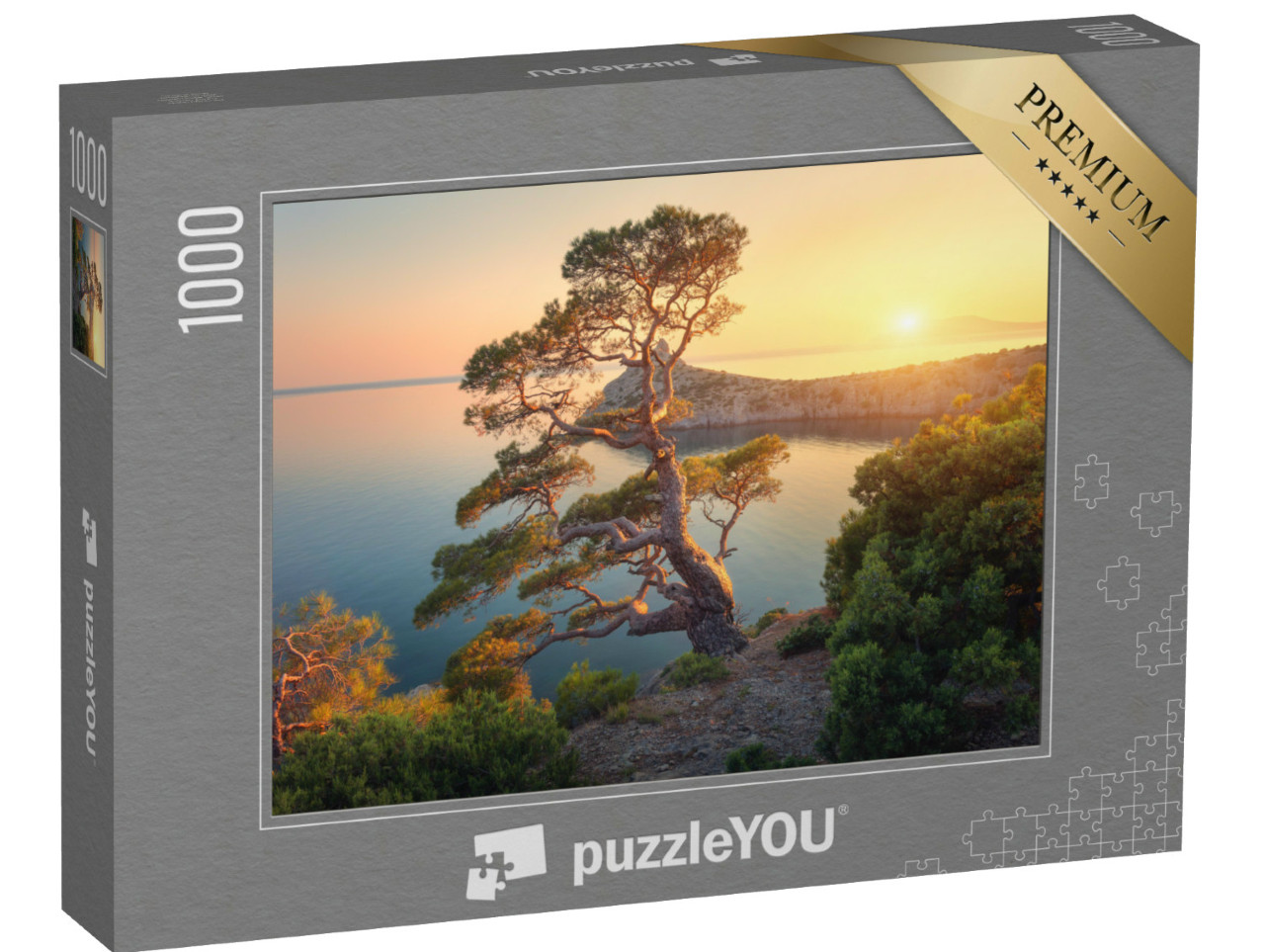 Puzzel 1000 stukjes „Boom op een berg aan zee bij zonsondergang“