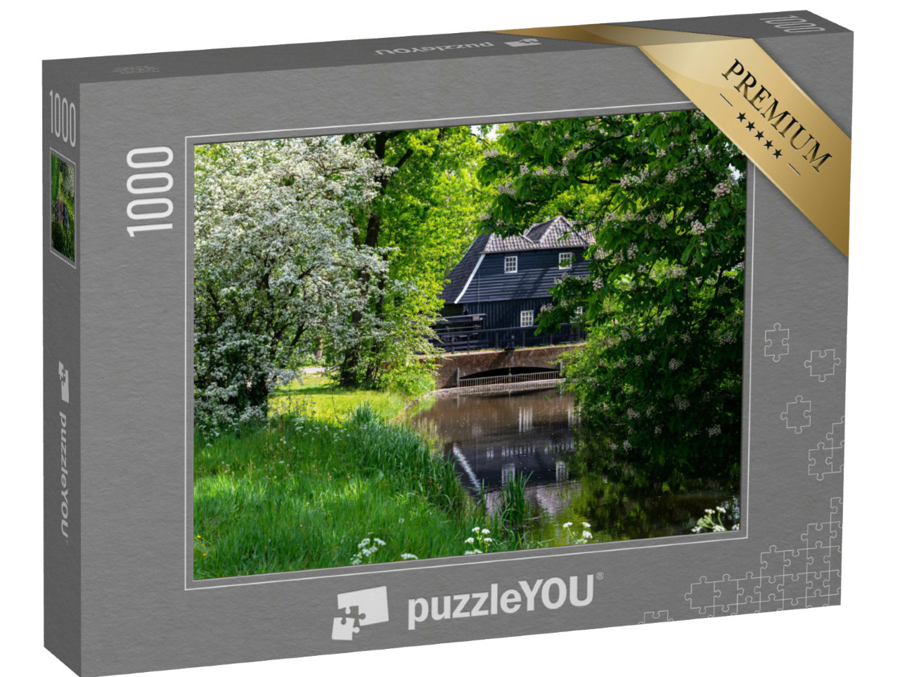 Puzzel 1000 stukjes „Voorjaarsbloesem in een groen park met een oude watermolen in het centrum van Eindhoven, Noord-Brabant“