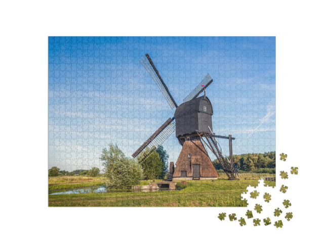 Puzzel 1000 stukjes „poldermolen Noordeveldse Molen in het dorp Dussen, Noord-Brabant“
