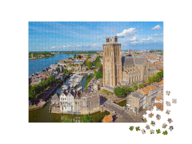 Puzzel 1000 stukjes „De skyline van Dordrecht met kerk en grachtenpanden in de Nederlandse Oude Maas“