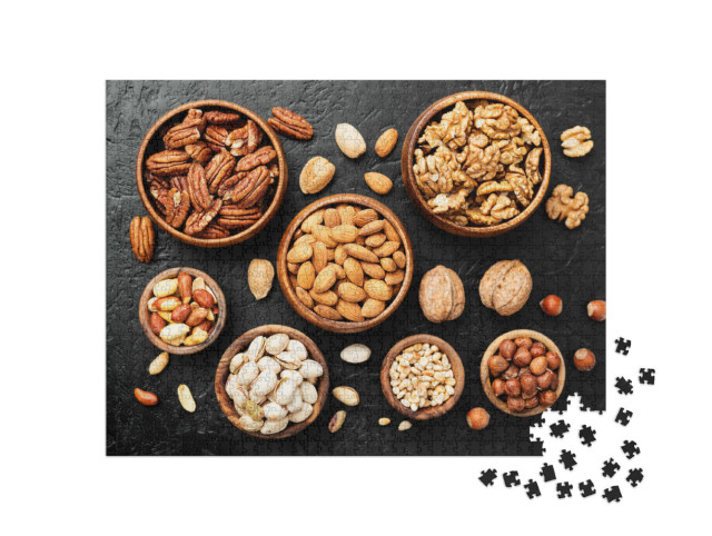 Puzzel 1000 stukjes „Notenmix in houten schelpen“