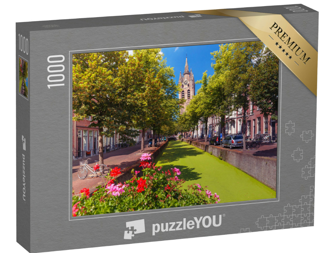 Puzzel 1000 stukjes „De Oude Delftse gracht en de scheve toren van de Oude Kerk in Delft, Zuid-Holland“