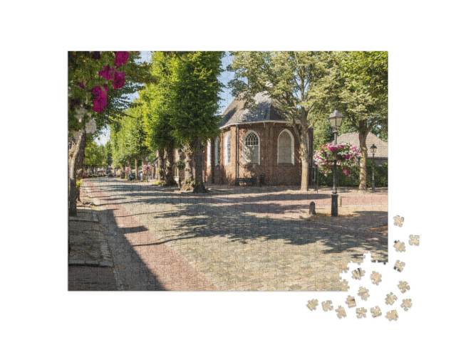 Puzzel 1000 stukjes „Dorpskern van Eersel, herkenningspunt van Noord-Brabant“