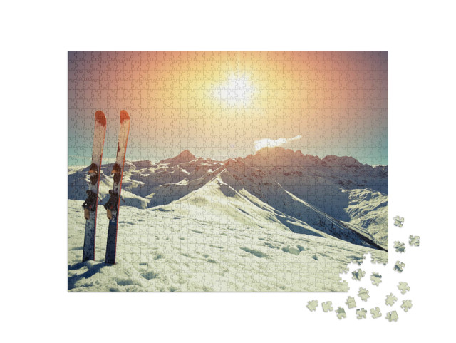 Puzzel 1000 stukjes „Ski's in de sneeuw in de bergen“