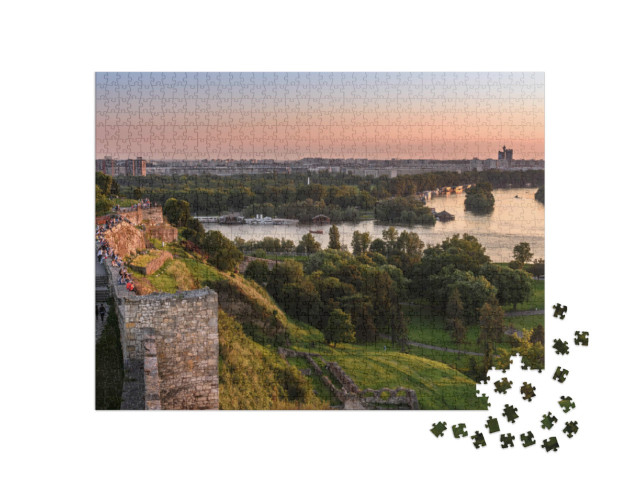 Puzzel 1000 stukjes „Zonsondergang bij de Belgrado-toren Kalemegdan aan de rivier de Sava“