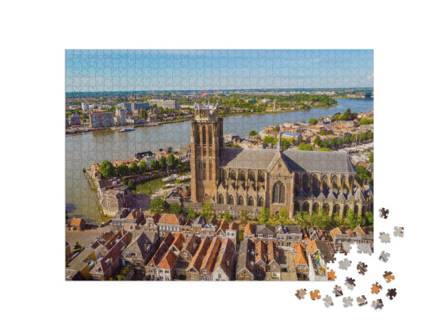 Puzzel 1000 stukjes „De skyline van Dordrecht met kerk en grachtenpanden in de Oude Maas“