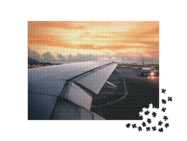 Puzzel 1000 stukjes „Zonsondergang op het vliegveld“