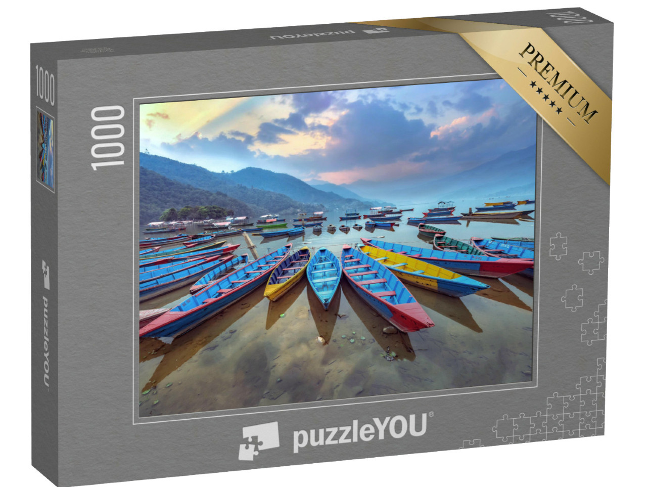Puzzel 1000 stukjes „Typische kleurrijke roeiboten aan de oever van het Phewa meer, Nepal“