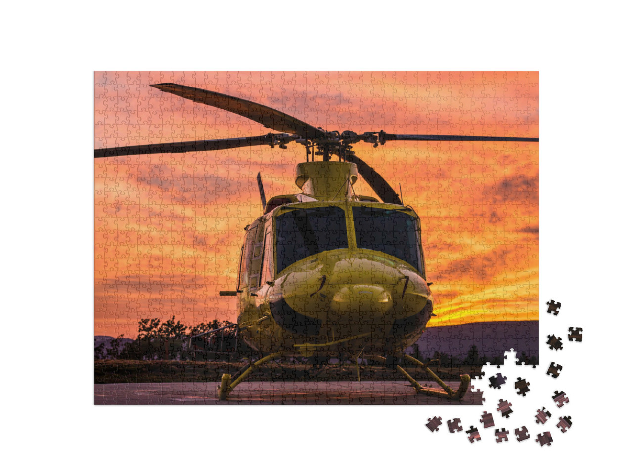 Puzzel 1000 stukjes „Helikopter in een spectaculaire zonsondergang“