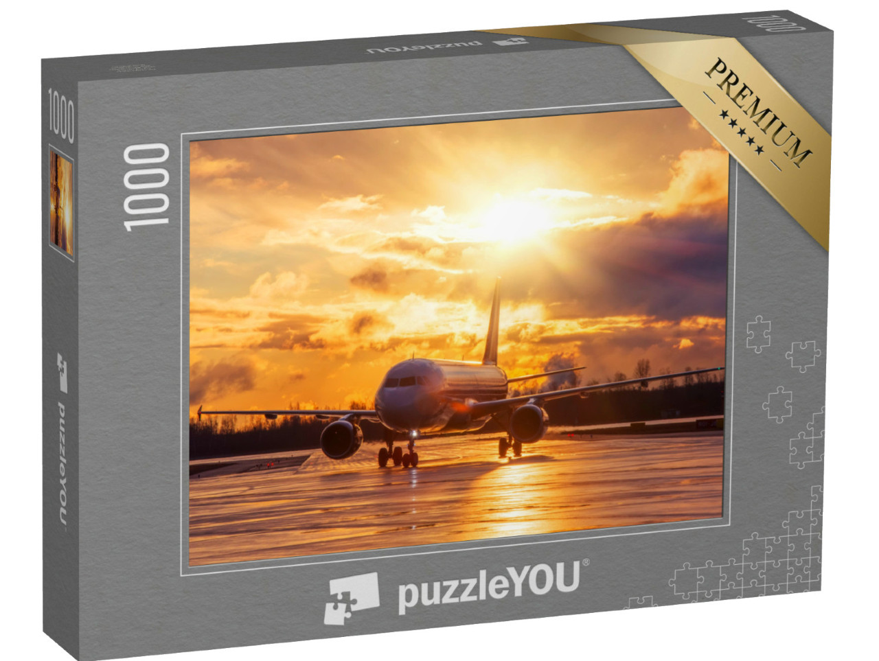 Puzzel 1000 stukjes „Vliegtuigen op de startbaan in de gloedvolle zonsondergang“