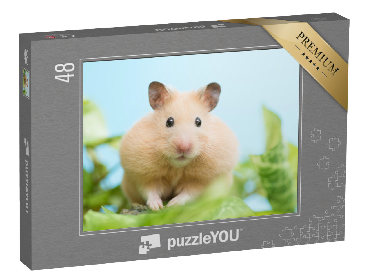 Puzzel 48 stukjes „Goudhamster omringd door groene bladeren“